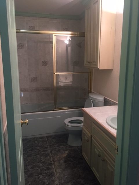 110 Tamarack Loop Laredo, TX 78045 - Photo 10 of 13 a bathroom with a sink a toilet and shower