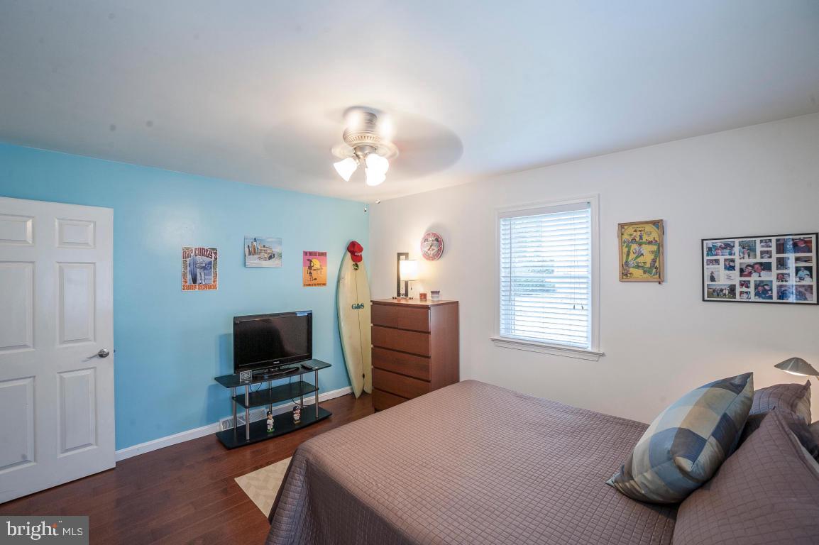 26 Buttonwood Drive Lititz, PA 17543 - Photo 12 of 39 a bedroom with furniture and a flat screen tv
