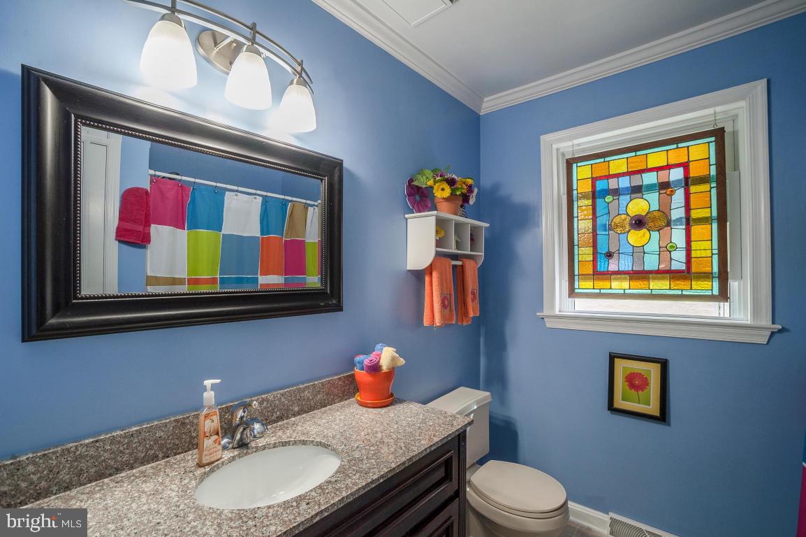 26 Buttonwood Drive Lititz, PA 17543 - Photo 15 of 39 a bathroom with a sink a toilet and a mirror