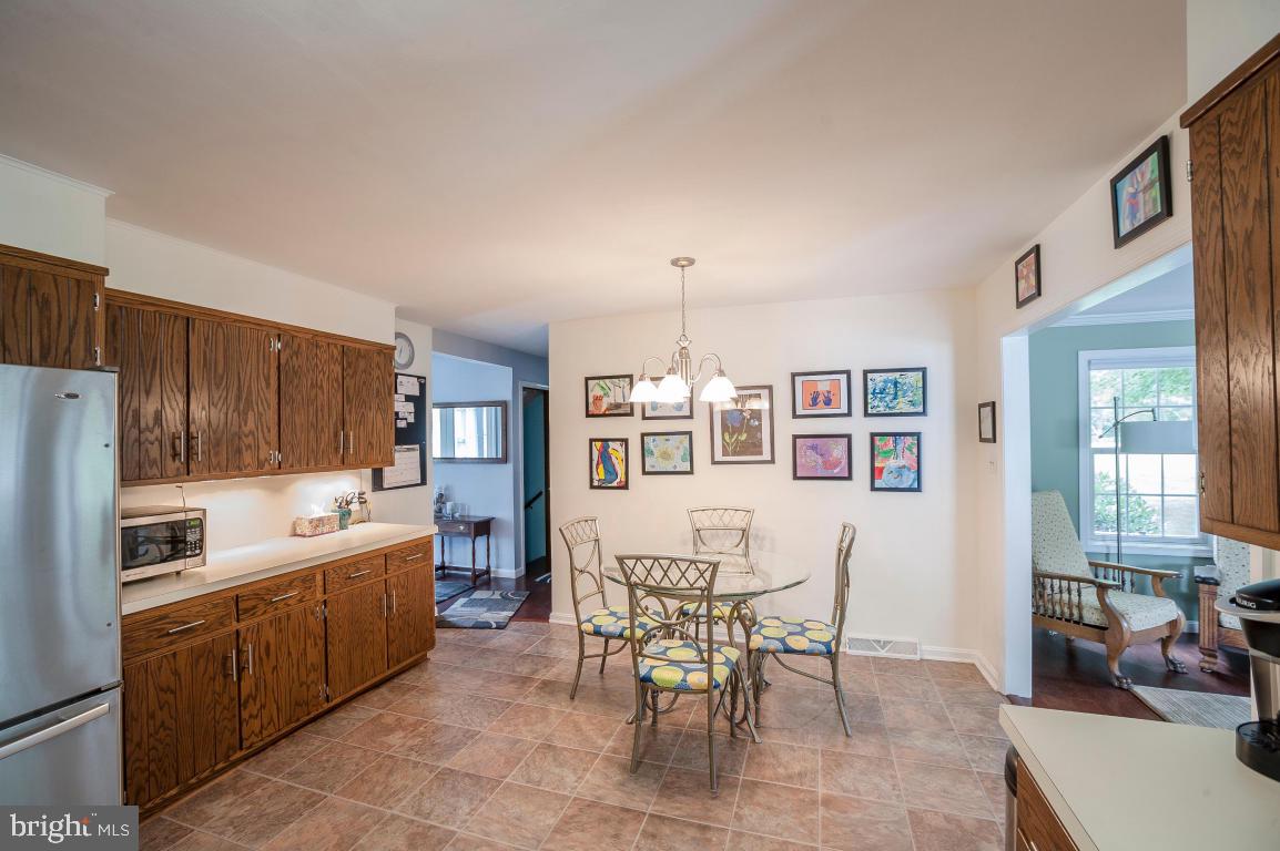 26 Buttonwood Drive Lititz, PA 17543 - Photo 4 of 39 a large kitchen with a table and chairs in it