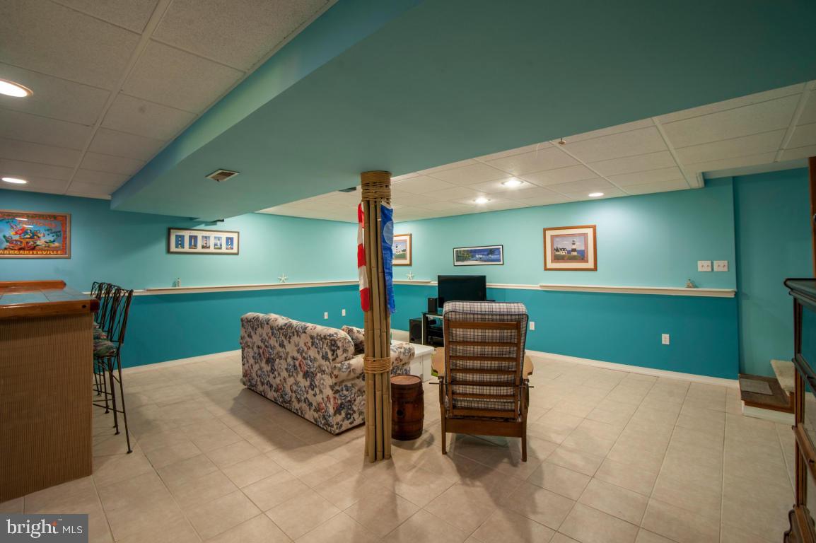26 Buttonwood Drive Lititz, PA 17543 - Photo 33 of 39 a living room with furniture and a projector