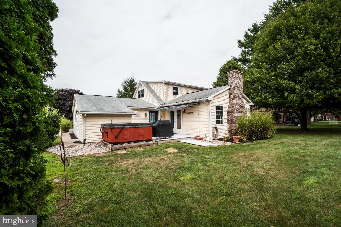 26 Buttonwood Drive Lititz, PA 17543 - Photo 36 of 39 a view of a house with a yard and sitting area
