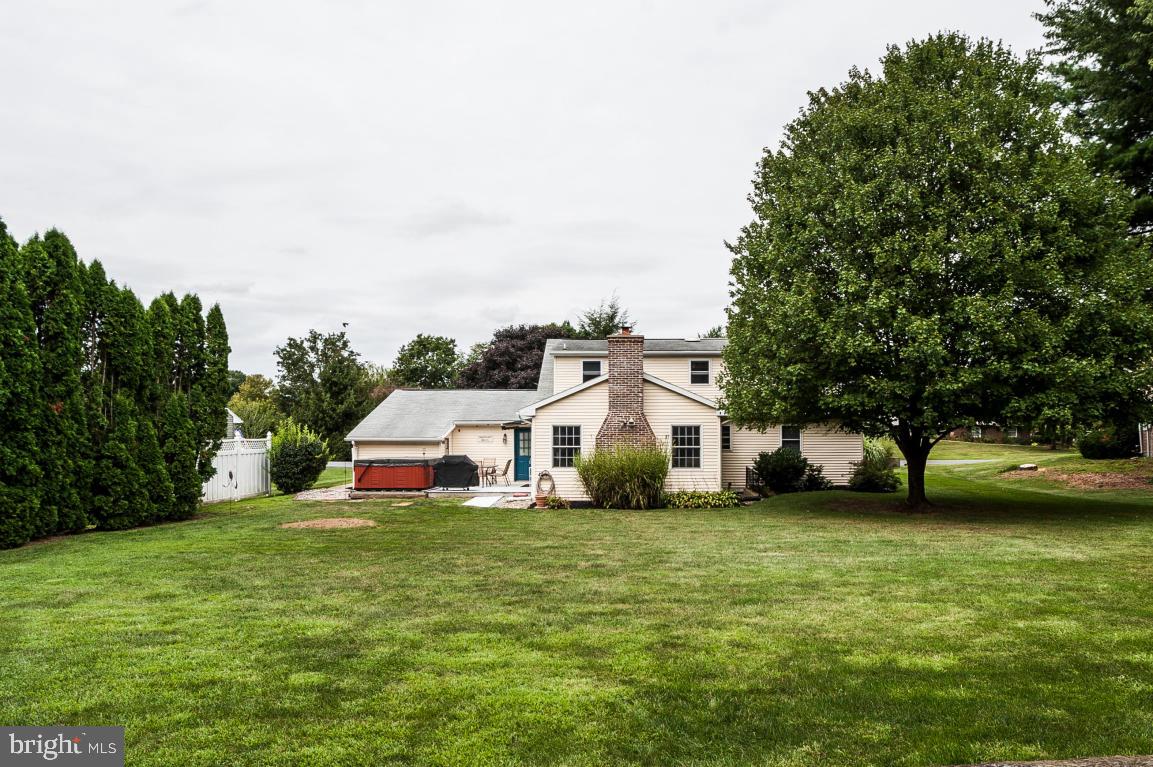 26 Buttonwood Drive Lititz, PA 17543 - Photo 38 of 39 a house that is sitting in the grass with large trees