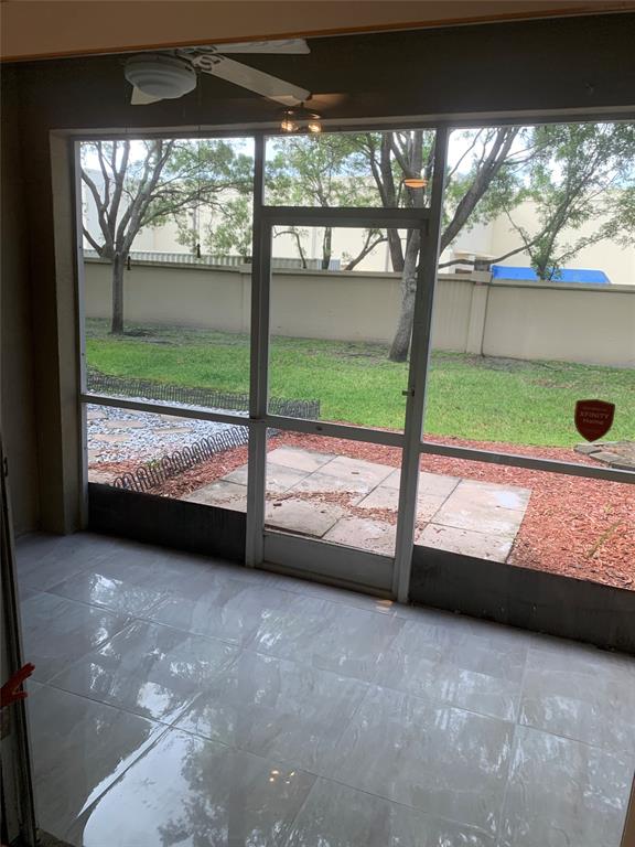 12017 Southwest 2nd Street, Unit 12017 Pembroke Pines, FL 33025 - Photo 8 of 13 a view of outdoor space and swimming pool