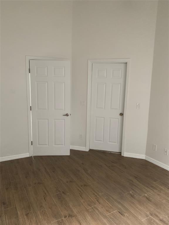 12017 Southwest 2nd Street, Unit 12017 Pembroke Pines, FL 33025 - Photo 9 of 13 a view of room with wooden floor