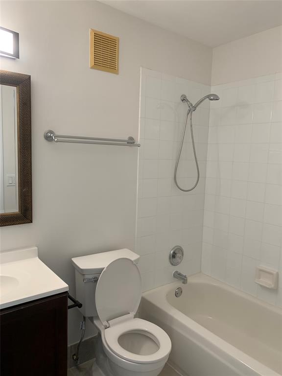 12017 Southwest 2nd Street, Unit 12017 Pembroke Pines, FL 33025 - Photo 10 of 13 a bathroom with a toilet and a shower