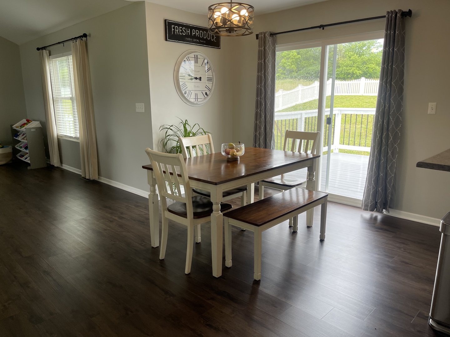 6 Emily Drive Spring Valley, IL 61362 - Photo 12 of 25 a dining room with wooden floor a chandelier a wooden table and chairs