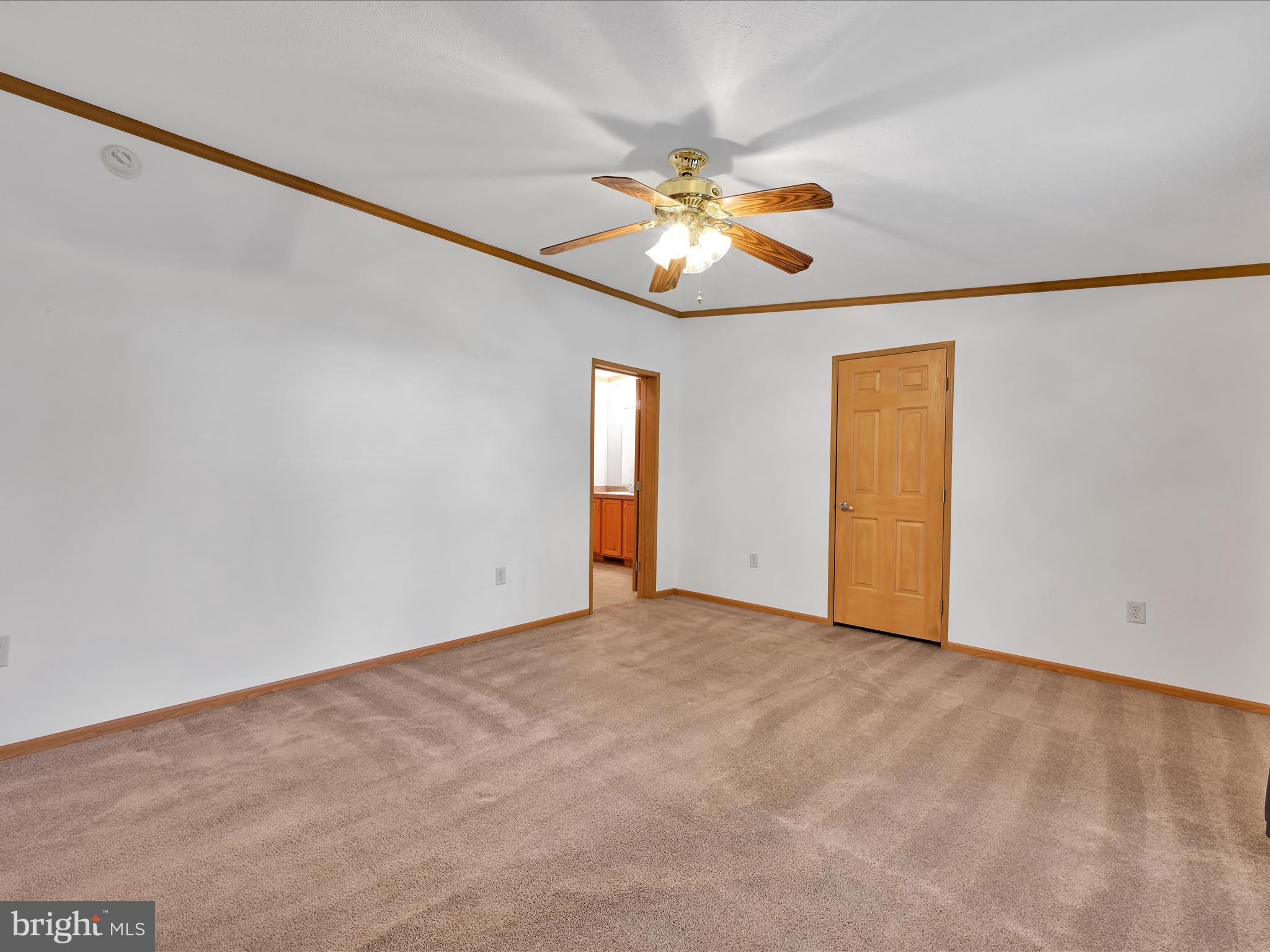 1044 Hemlock Circle Manheim, PA 17545 - Photo 16 of 31 an empty room with windows and fan