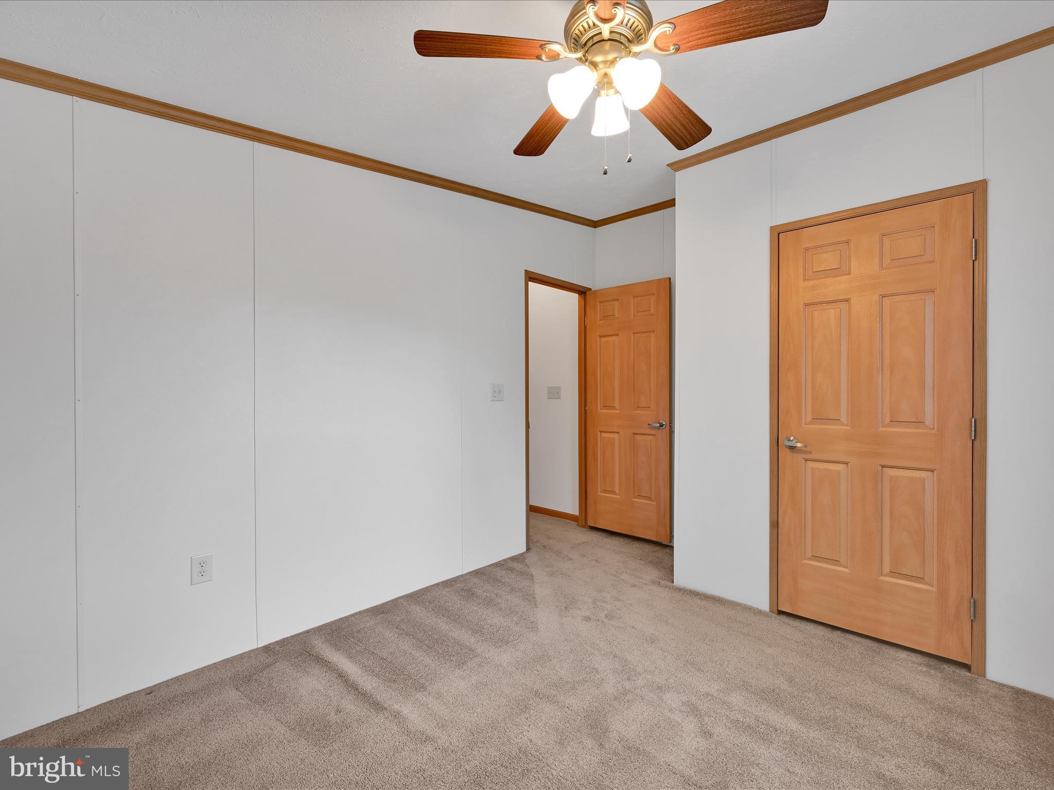 1044 Hemlock Circle Manheim, PA 17545 - Photo 23 of 31 an empty room with a chandelier fan