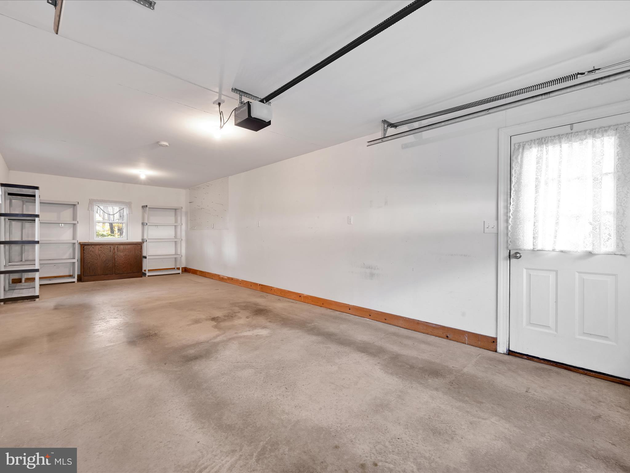 1044 Hemlock Circle Manheim, PA 17545 - Photo 26 of 31 a view of empty room with wooden floor and cabinet