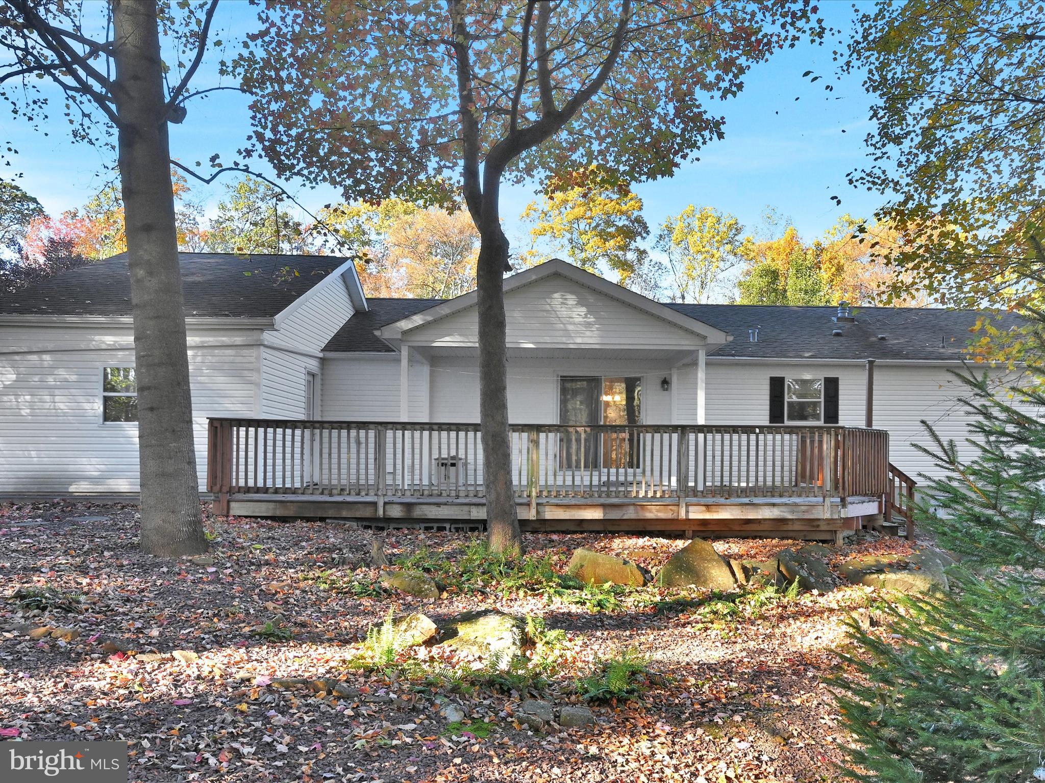 1044 Hemlock Circle Manheim, PA 17545 - Photo 31 of 31 a view of a white house with a large tree and yard