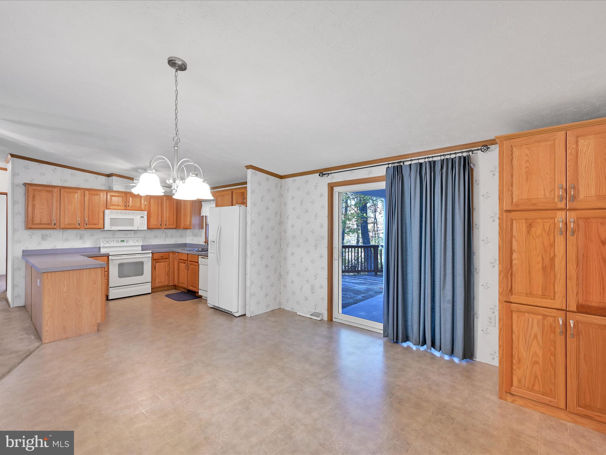 1044 Hemlock Circle Manheim, PA 17545 - Photo 10 of 31 a view of a kitchen with furniture and refrigerator