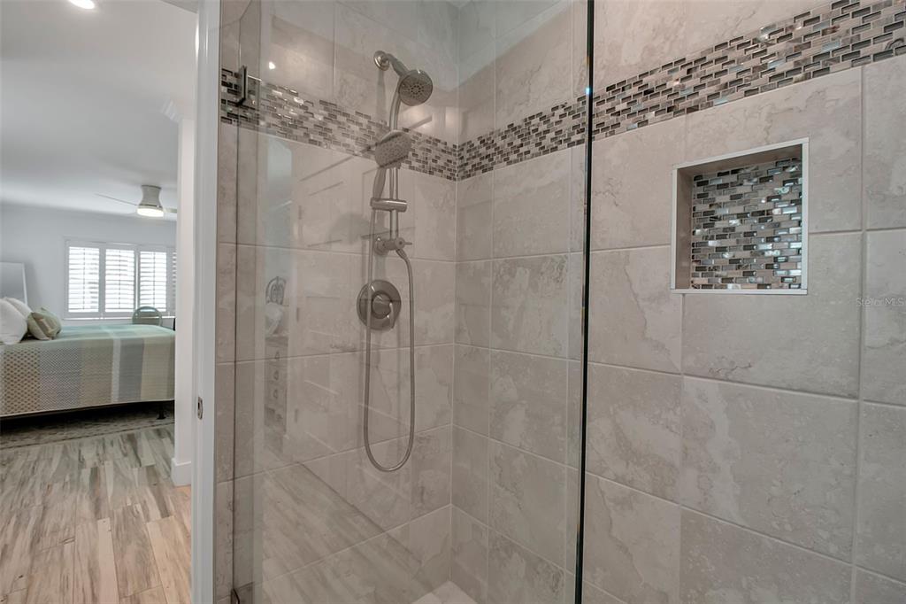 226 Golden Gate Point, Unit 21 Sarasota, FL 34236 - Photo 46 of 55 a bathroom with a shower