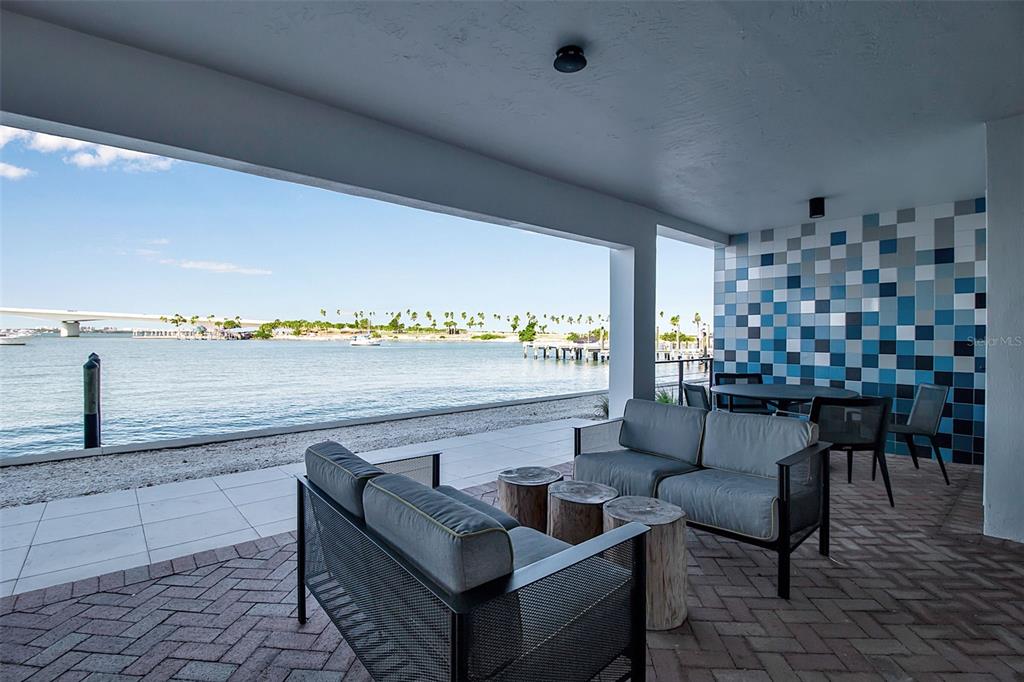 226 Golden Gate Point, Unit 21 Sarasota, FL 34236 - Photo 50 of 55 a outdoor living space with furniture and city view