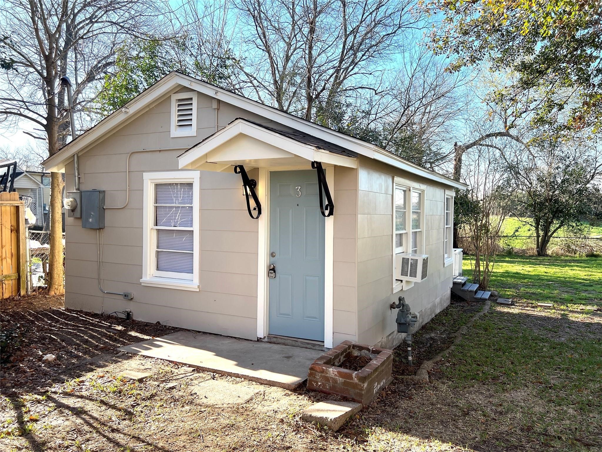 2714 Carrolton Street, Unit BACK Houston, TX 77023 - Photo 2 of 14 a view of a house with a yard
