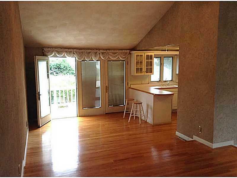 46 Oneida Street Pawtucket, RI 02860 - Photo 7 of 19 Dining Room. French doors to the raised deck off kitchen.