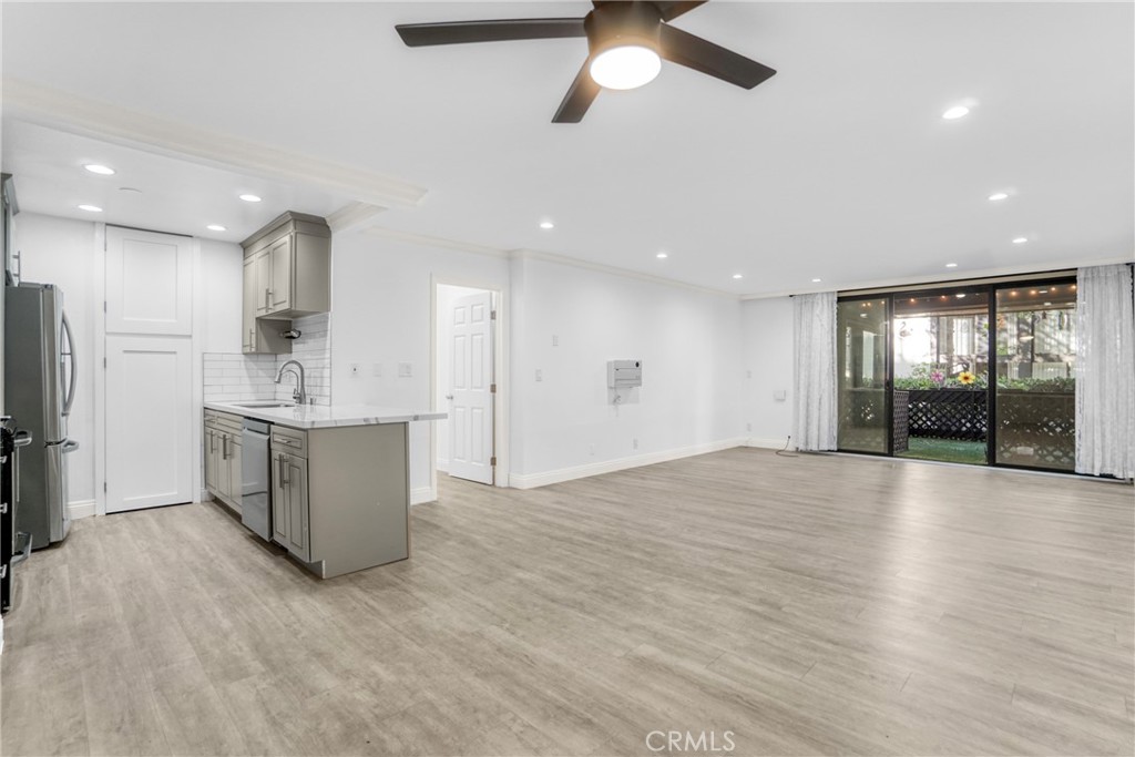 7765 West 91st Street, Unit F1113 Playa del Rey, CA 90293 - Photo 1 of 41 a view of kitchen with stainless steel appliances granite countertop refrigerator sink and stove