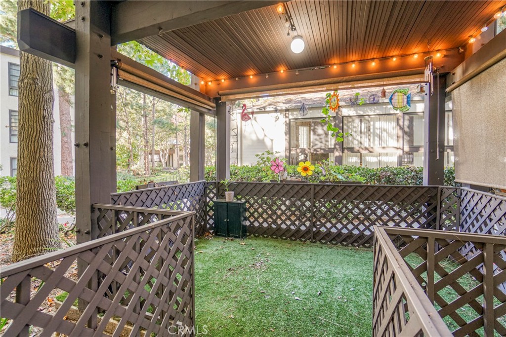 7765 West 91st Street, Unit F1113 Playa del Rey, CA 90293 - Photo 14 of 41 a view of a porch with wooden floor