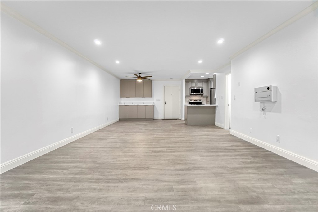 7765 West 91st Street, Unit F1113 Playa del Rey, CA 90293 - Photo 9 of 41 a view of empty room with wooden floor