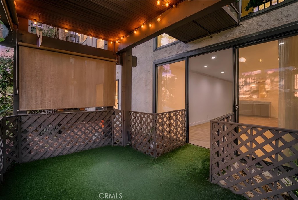 7765 West 91st Street, Unit F1113 Playa del Rey, CA 90293 - Photo 10 of 41 a view of a porch with garden