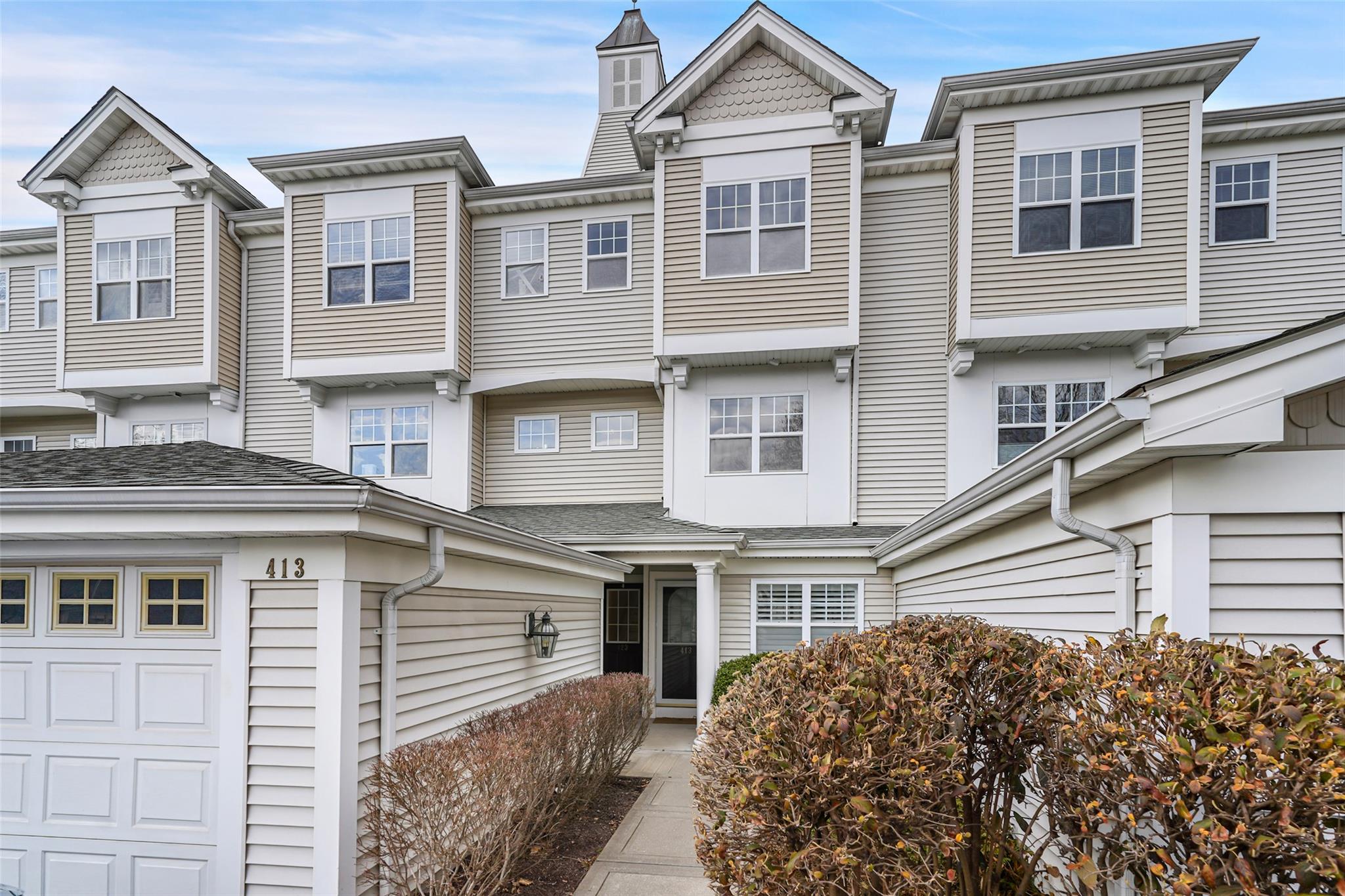 Multi unit property featuring a garage