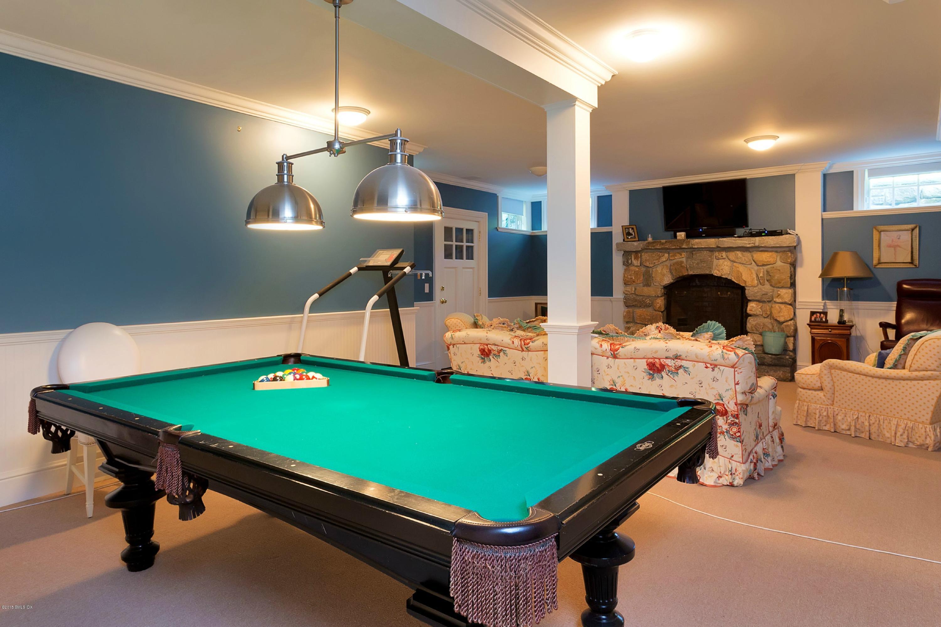 521 Field Point Road Greenwich, CT 06830 - Photo 23 of 25 a room with pool table and windows