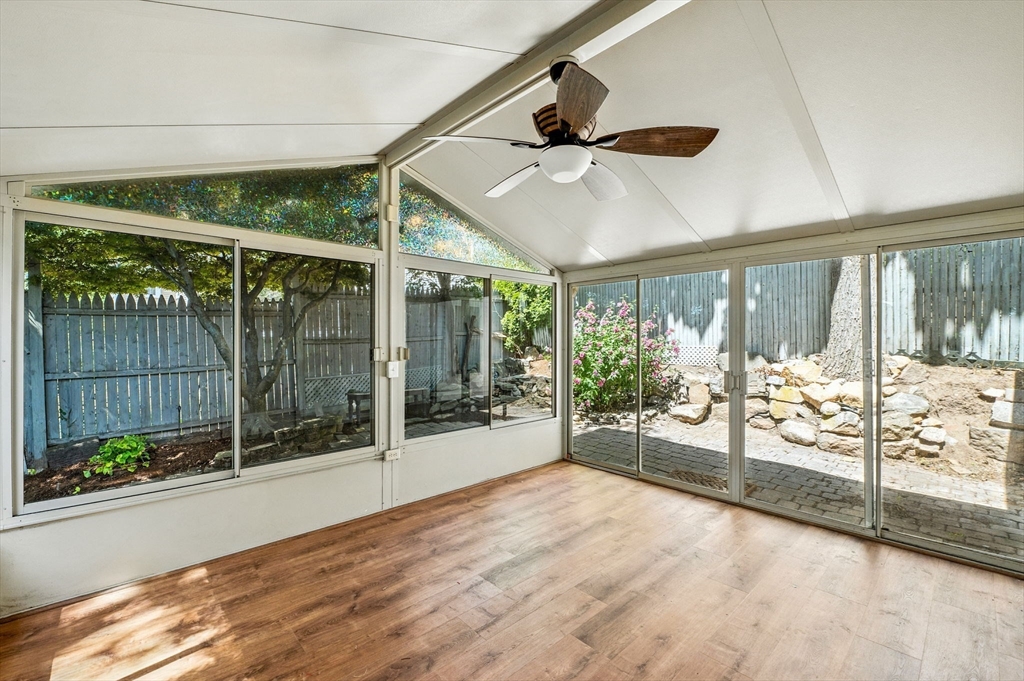 45 B Warner Street Gloucester, MA 01930 - Photo 14 of 39 a view of an empty room with wooden floor and a window