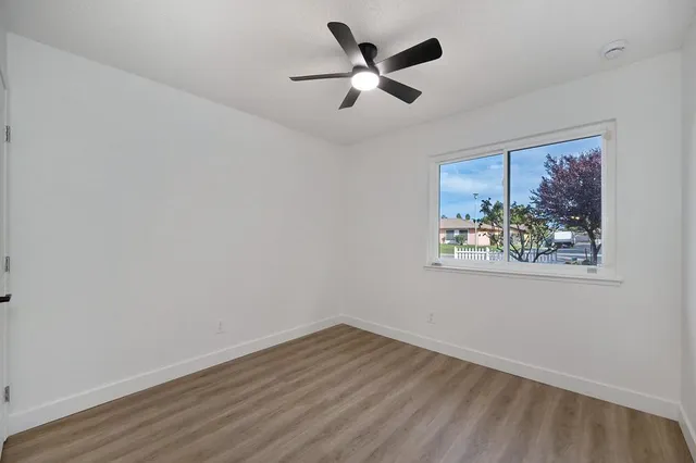 a kitchen with a sink and a window