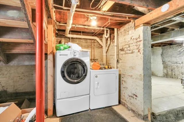 a utility room with dryer and washer