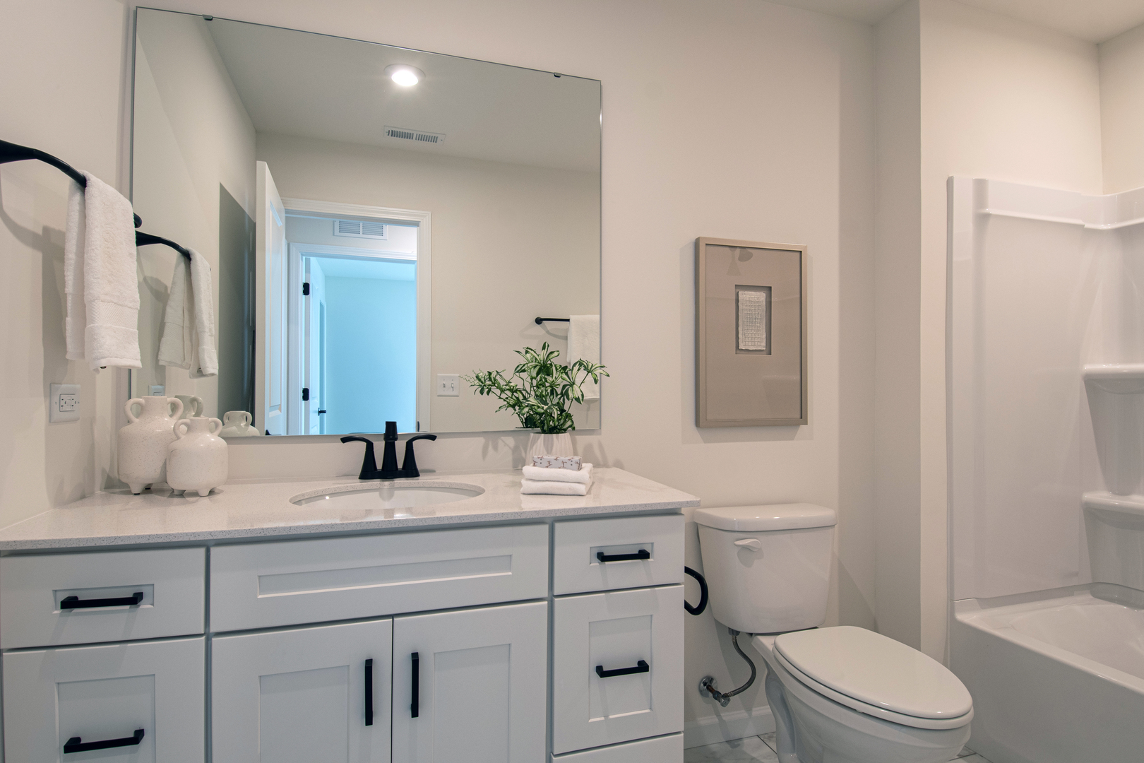 2244 Quartet Road Plainfield, IL 60585 - Photo 11 of 18 a bathroom with a granite countertop toilet sink and mirror