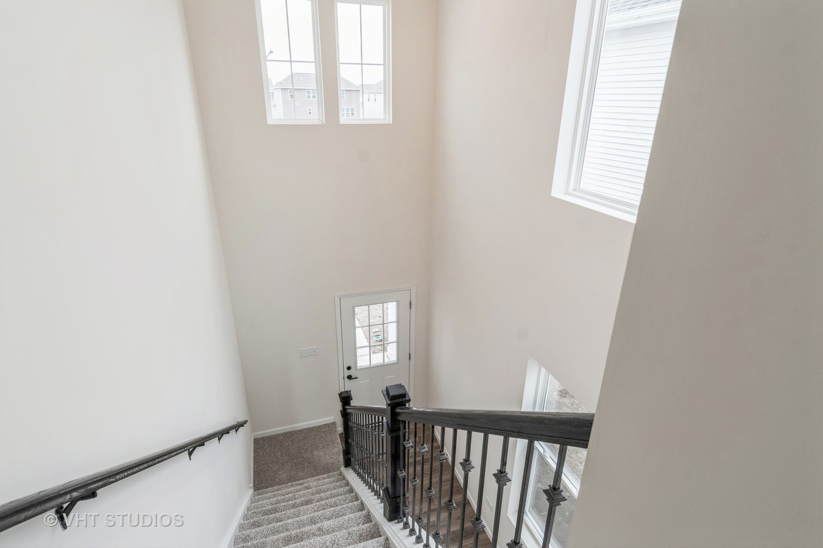 2244 Quartet Road Plainfield, IL 60585 - Photo 13 of 18 a view of a hallway with windows