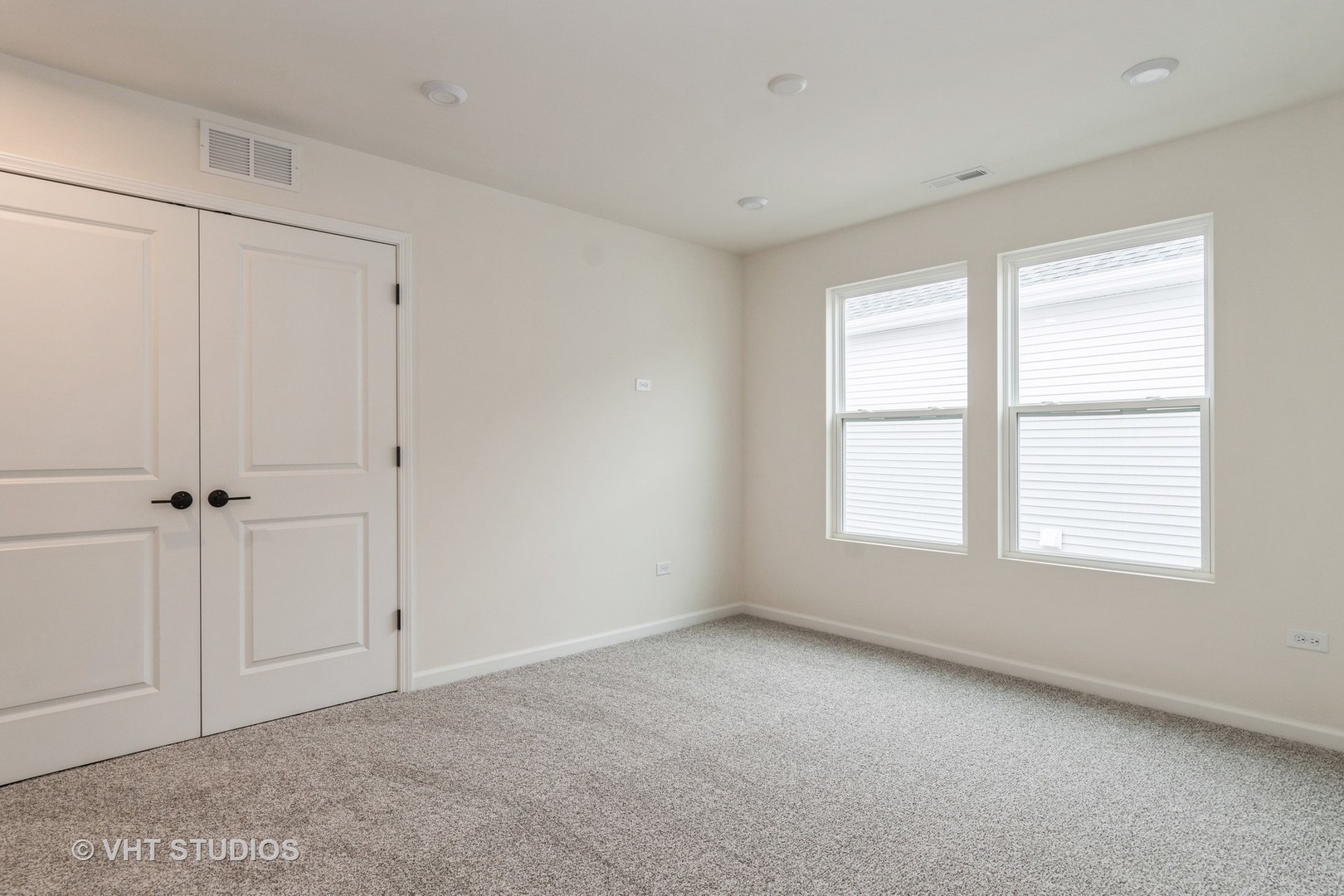 2244 Quartet Road Plainfield, IL 60585 - Photo 14 of 18 a view of an empty room with a window