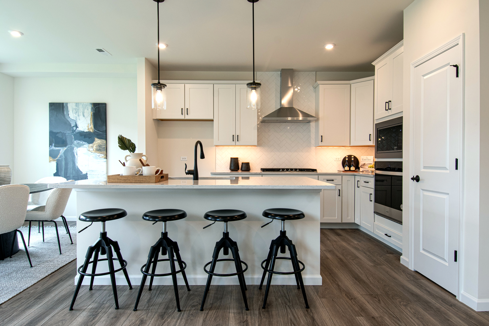 2244 Quartet Road Plainfield, IL 60585 - Photo 6 of 18 a kitchen with granite countertop white cabinets and stainless steel appliances
