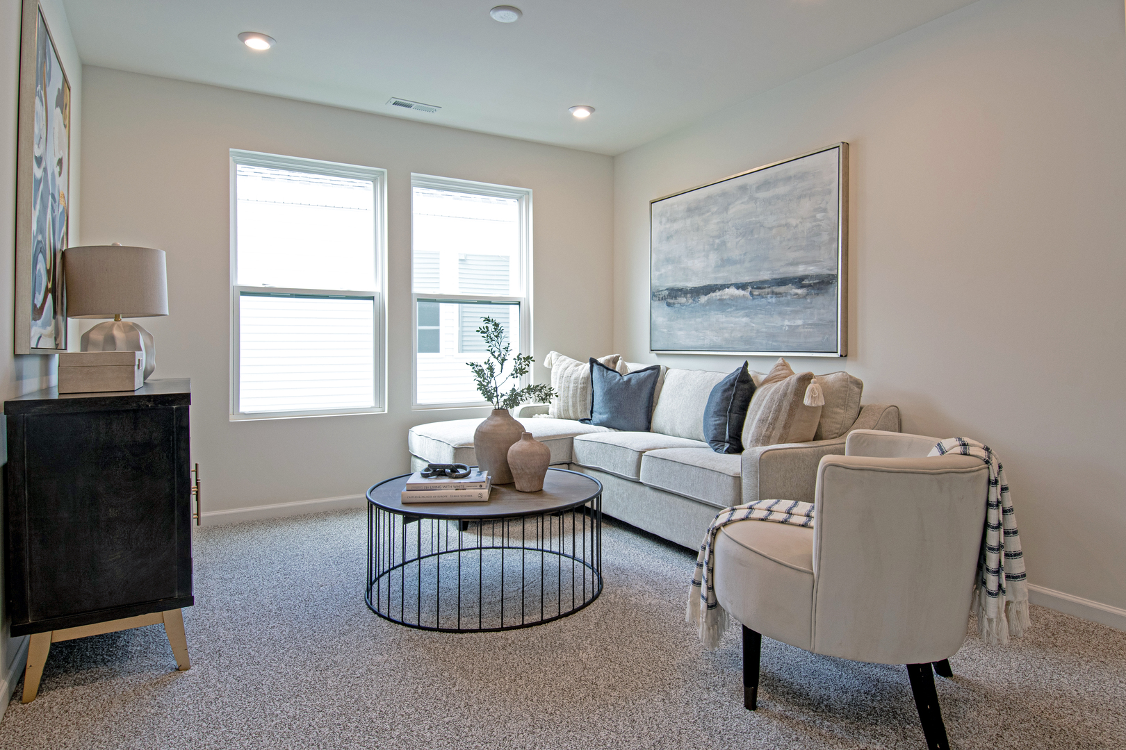 2244 Quartet Road Plainfield, IL 60585 - Photo 8 of 18 a living room with furniture a rug and a large window