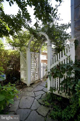 8810 Ridge Road Bethesda, MD 20817 - Photo 22 of 30 a front view of a house with a yard