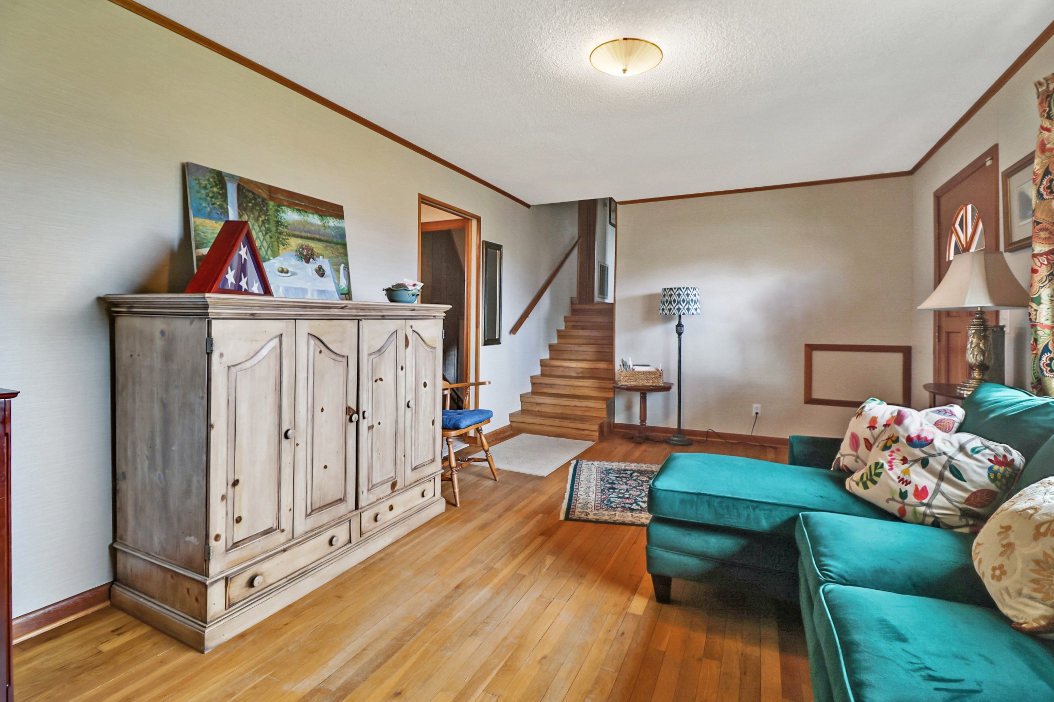1209 Sequatchie Road Pikeville, TN 37367 - Photo 12 of 40 a living room with furniture and wooden floor