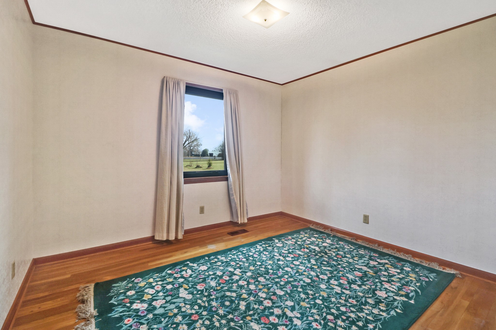 1209 Sequatchie Road Pikeville, TN 37367 - Photo 20 of 40 a view of a room with rack on the wall and a window