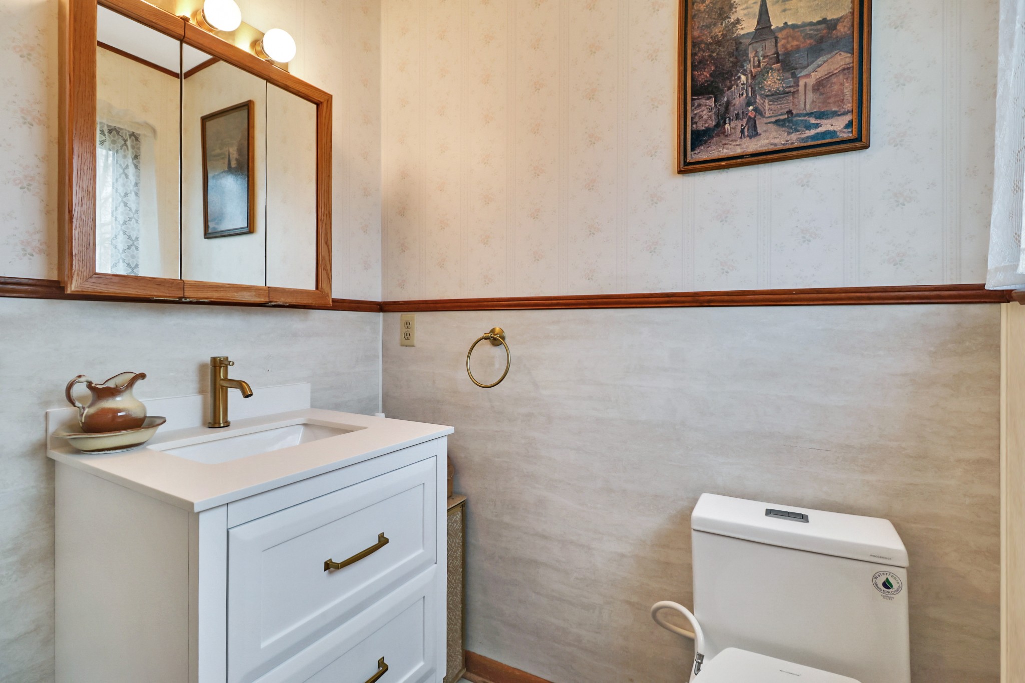 1209 Sequatchie Road Pikeville, TN 37367 - Photo 21 of 40 a bathroom with a sink a toilet and a mirror