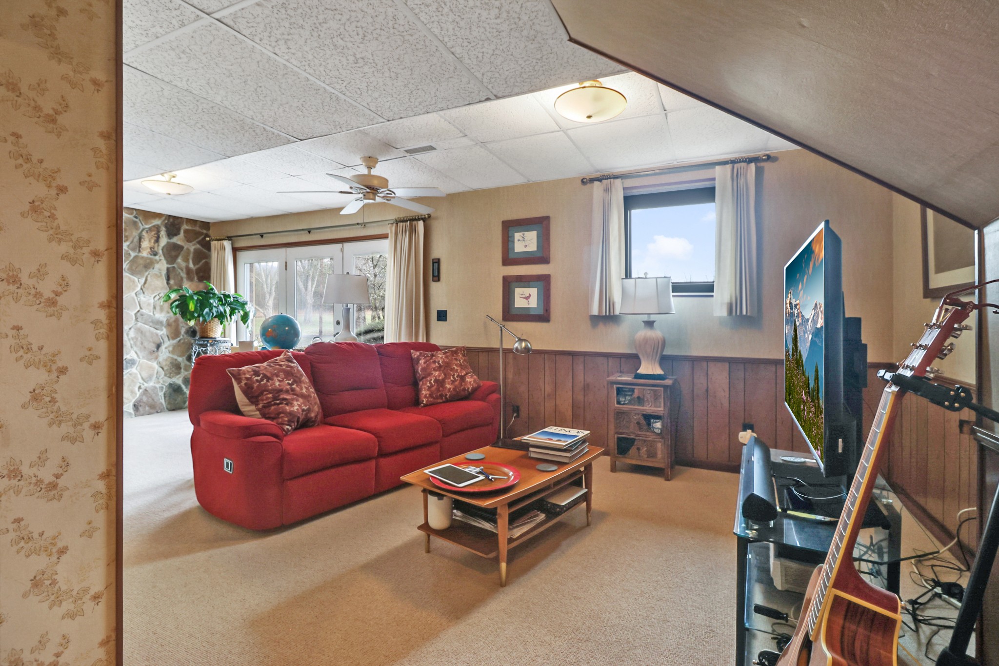 1209 Sequatchie Road Pikeville, TN 37367 - Photo 22 of 40 a living room with furniture a flat screen tv and a window