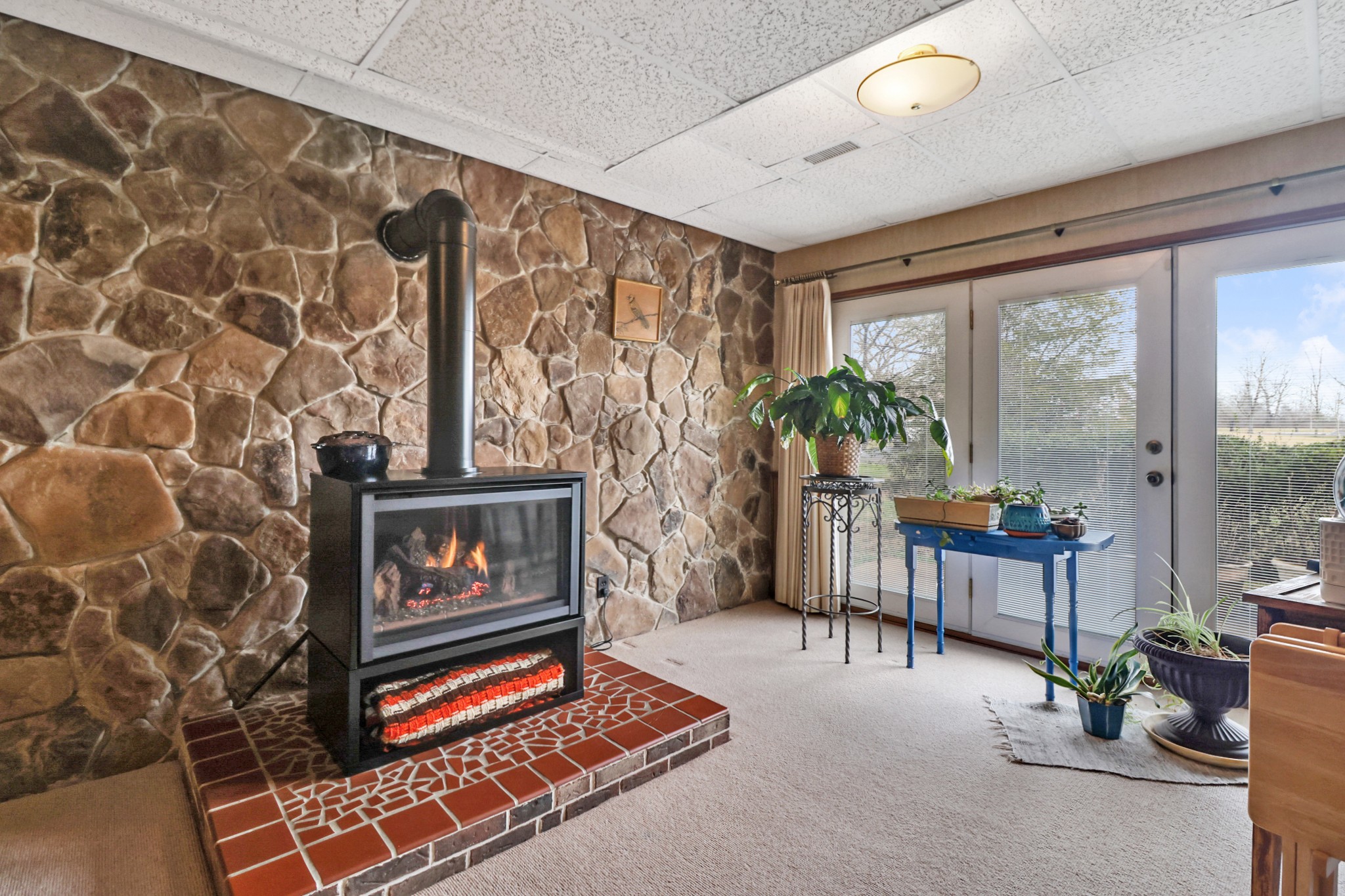 1209 Sequatchie Road Pikeville, TN 37367 - Photo 25 of 40 a living room with furniture and a fireplace