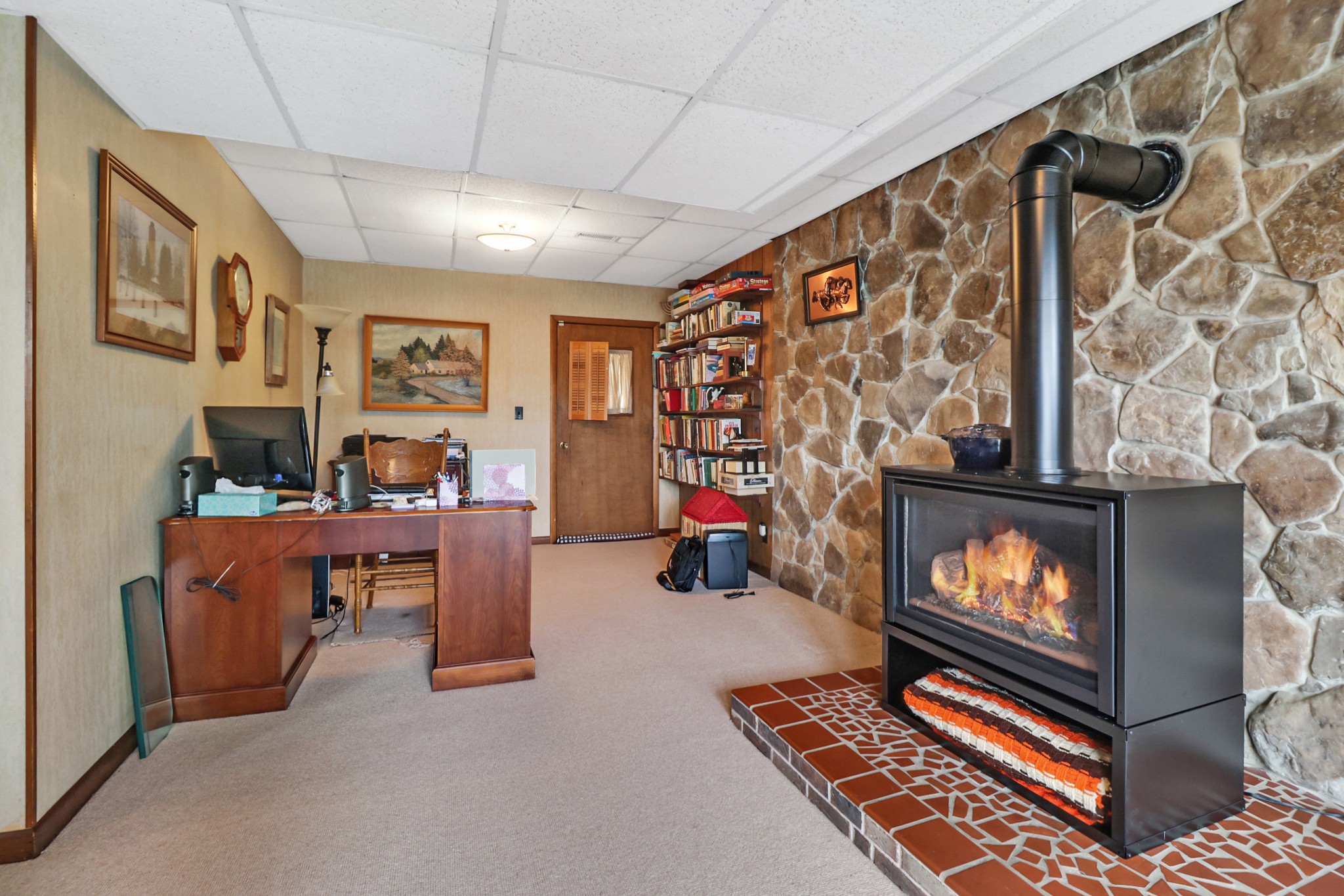 1209 Sequatchie Road Pikeville, TN 37367 - Photo 26 of 40 a living room with furniture and a fireplace