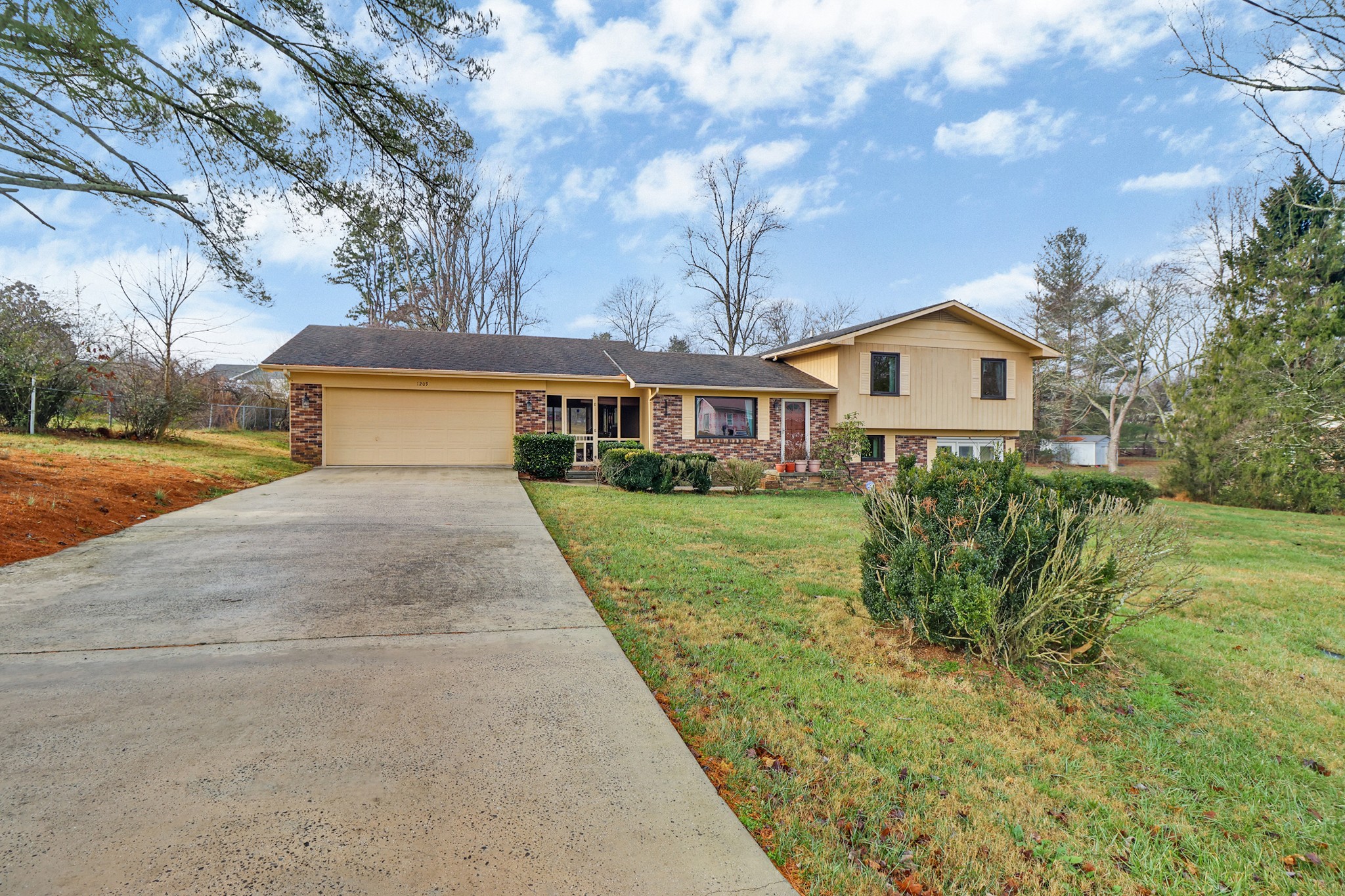 1209 Sequatchie Road Pikeville, TN 37367 - Photo 36 of 40 a view of house with big yard and large trees