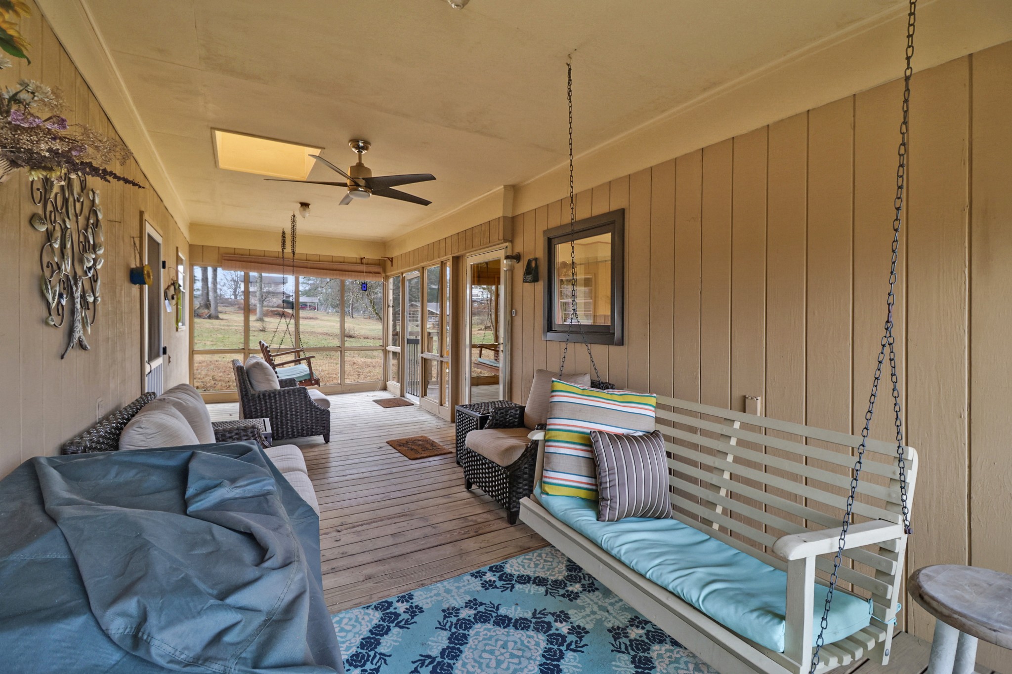 1209 Sequatchie Road Pikeville, TN 37367 - Photo 5 of 40 a living room with couches chairs and large view with wooden floor
