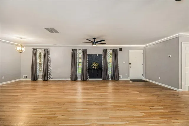 a kitchen with stainless steel appliances granite countertop a sink and cabinets