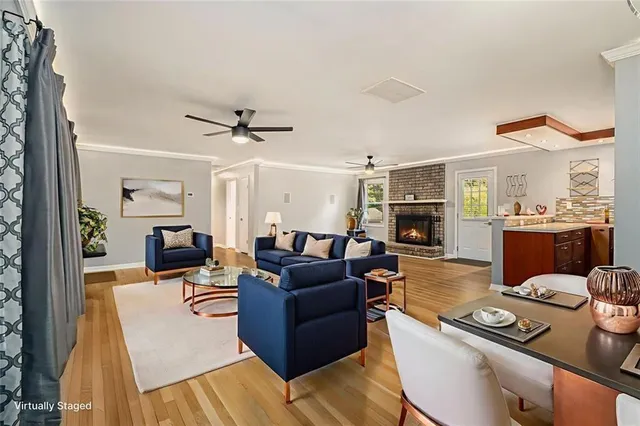 a kitchen with a sink a stove and cabinets