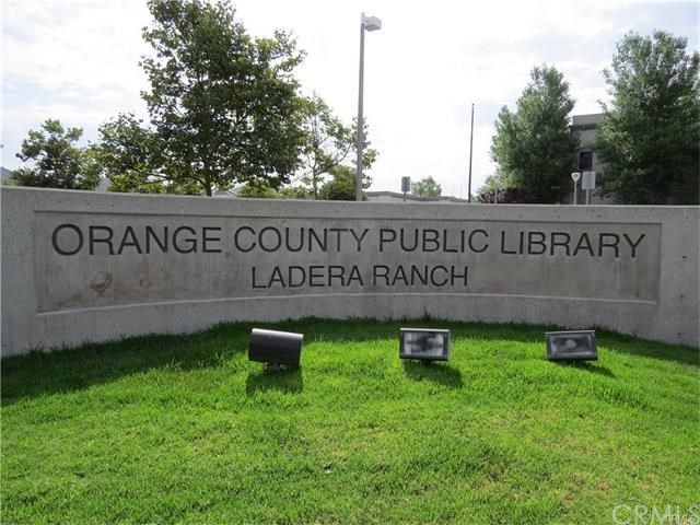 a view of outdoor space with garden and deck