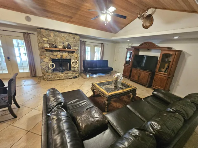 a view of kitchen and dining area with furniture