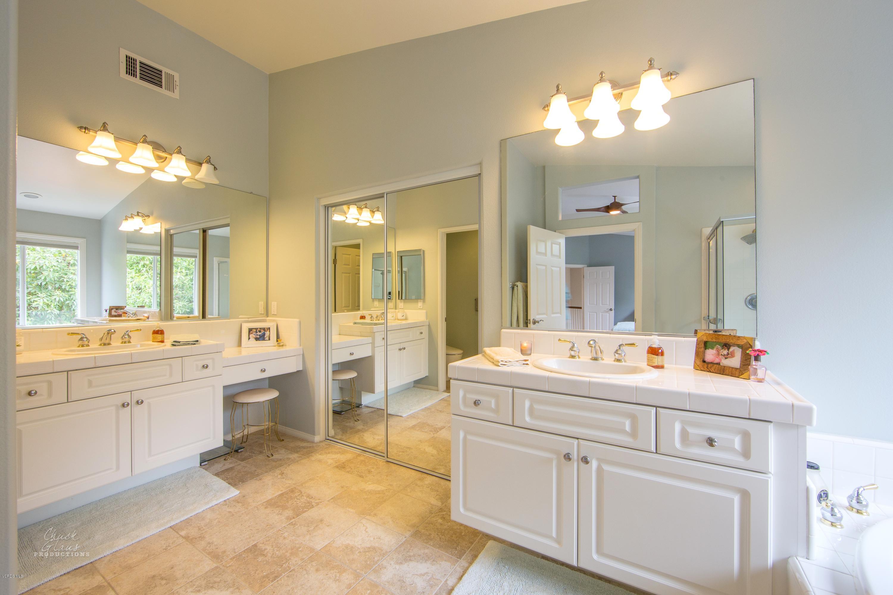 2073 Alborada Drive Camarillo, CA 93010 - Photo 40 of 51 a bathroom with a sink vanity and a mirror