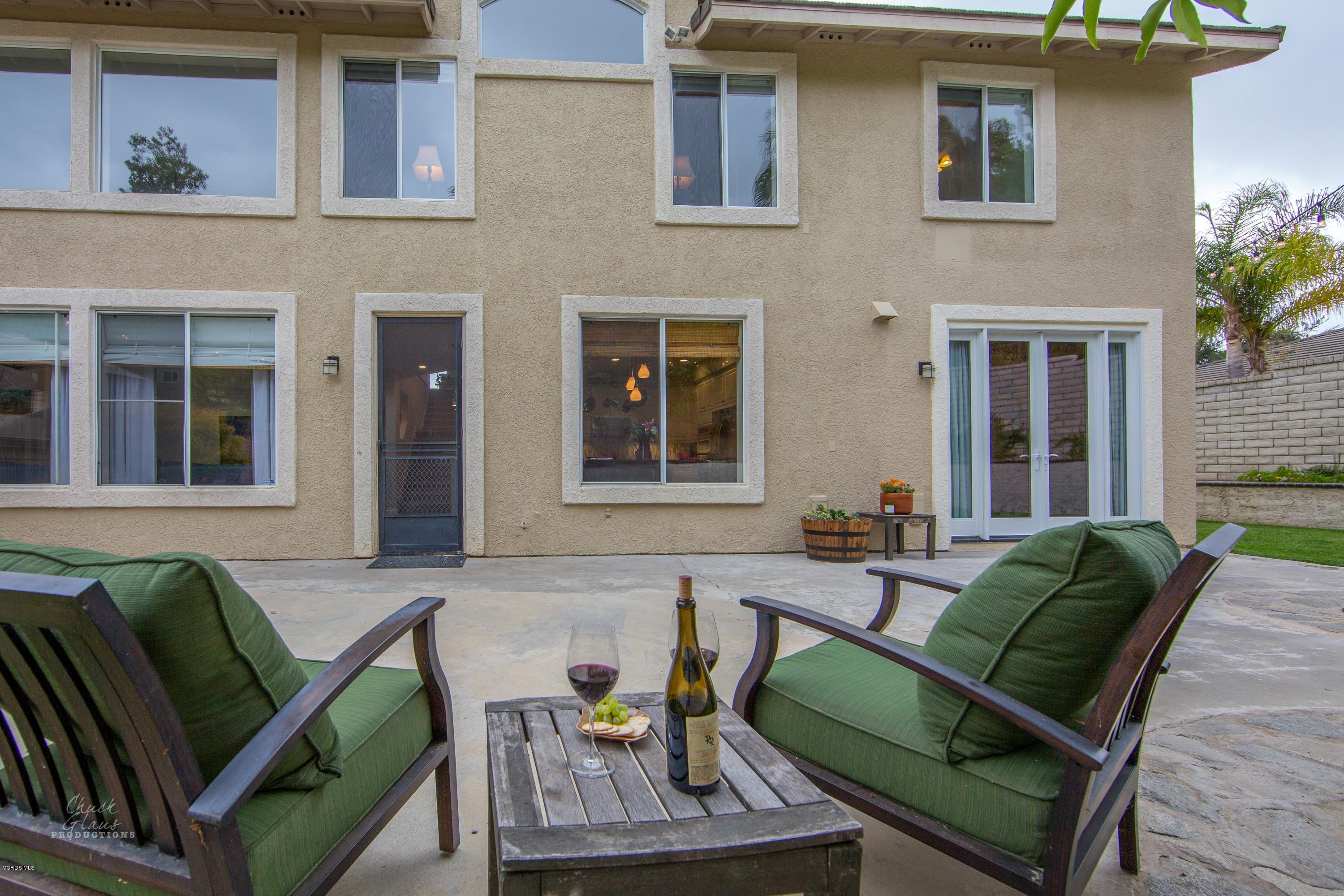 2073 Alborada Drive Camarillo, CA 93010 - Photo 46 of 51 a view of a patio with couches chairs and potted plants