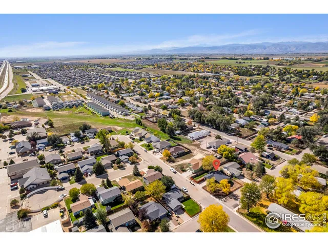 a small yard with wooden fence